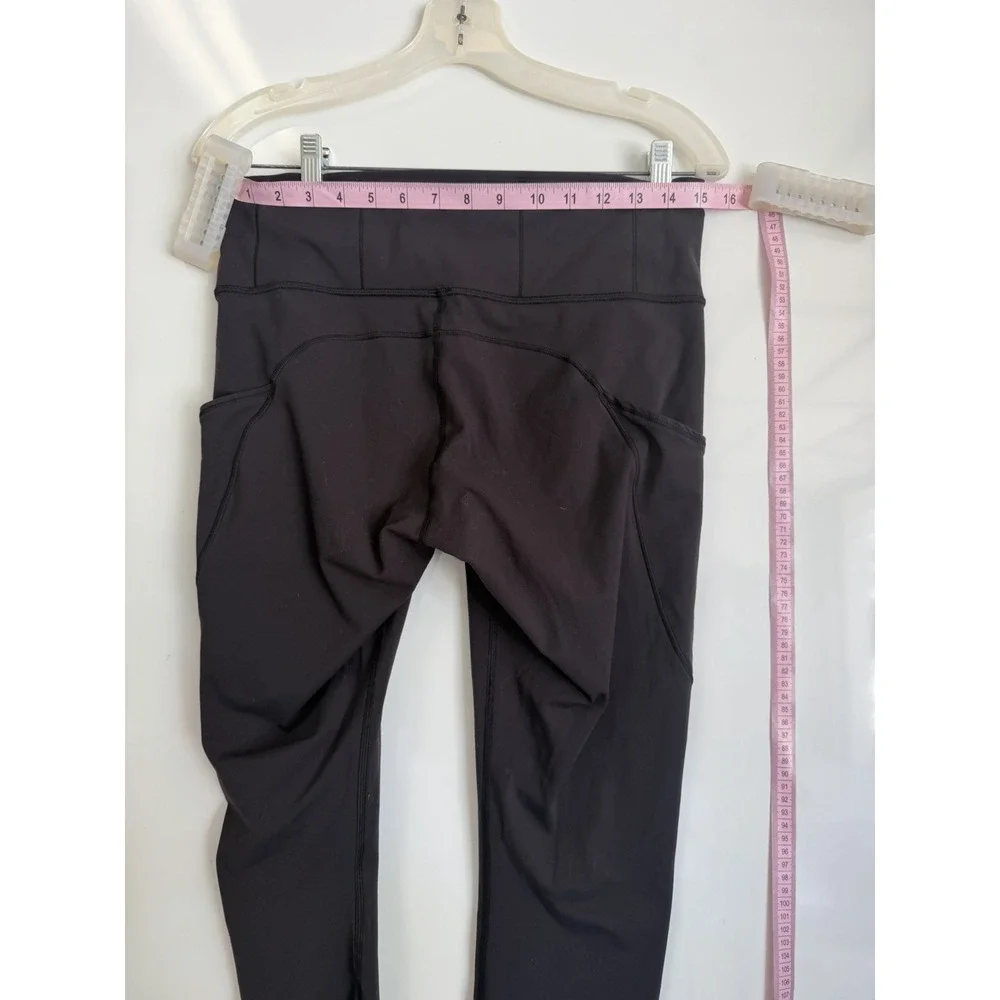 Lululemon Women's Black Athletic Leggings with Side Pockets High Rise 8